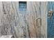 Modern shower with blue and gray marbled tiles, glass door, and niche at 8785 E Greenview Dr, Gold Canyon, AZ 85118