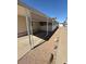 Carport featuring a gravel and concrete slab, providing covered parking at 9501 E Broadway Rd # 68, Mesa, AZ 85208