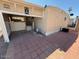 Paved carport featuring access to a covered patio and the home's entrance at 9501 E Broadway Rd # 68, Mesa, AZ 85208