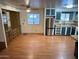 Kitchen area with wood cabinets and modern stainless-steel appliances with hardwood flooring throughout at 9501 E Broadway Rd # 68, Mesa, AZ 85208