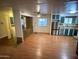 Kitchen featuring plenty of cabinets, stainless steel appliances, and hardwood floors at 9501 E Broadway Rd # 68, Mesa, AZ 85208