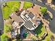 Luxurious estate boasts lush landscaping, a private pool, and extensive solar panels on the roof at 9693 N 129Th Pl, Scottsdale, AZ 85259
