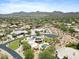 Panoramic aerial shot showcases the community's desert landscape and mountain views at 9693 N 129Th Pl, Scottsdale, AZ 85259