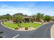 Well-manicured front yard with mature trees and shrubs in a desert community on a cul-de-sac at 9693 N 129Th Pl, Scottsdale, AZ 85259