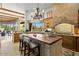 Spacious kitchen with a large island, stainless steel appliances, and an open-concept design at 9693 N 129Th Pl, Scottsdale, AZ 85259