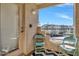 Balcony featuring blue chairs, decorative rug and view of the community at 101 N 7Th St # 225, Phoenix, AZ 85034