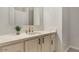 Bathroom featuring a vanity with a white countertop, a mirror and a shower at 101 N 7Th St # 225, Phoenix, AZ 85034