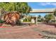 Community Entrance with mature trees and beautiful landscaping at 101 N 7Th St # 225, Phoenix, AZ 85034
