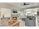 Cozy living room with a fireplace, comfortable seating, and an open layout at 101 N 7Th St # 225, Phoenix, AZ 85034