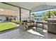 The backyard features a covered outdoor kitchen with a grill, tile flooring, and seating at 1015 E Paradise Ln, Phoenix, AZ 85022