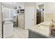 This bathroom offers a marble-topped sink, plenty of storage, and a tile shower at 1015 E Paradise Ln, Phoenix, AZ 85022