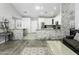 Open concept features the kitchen, living room, and stainless steel appliances at 1015 E Paradise Ln, Phoenix, AZ 85022