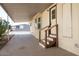 Covered carport leading to the home's entrance, providing shelter and convenience for residents at 11596 W Sierra Dawn Blvd # 182, Surprise, AZ 85378
