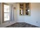 Charming dining area with corner display cabinets and a light-filled window, creating a cozy and inviting space at 11596 W Sierra Dawn Blvd # 182, Surprise, AZ 85378
