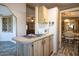 The spacious kitchen features an electric cooktop and white appliances, offering style and functionality for home cooking at 11596 W Sierra Dawn Blvd # 182, Surprise, AZ 85378
