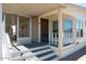 Inviting porch with a screened-in area, creating a comfortable transition to the interior of this home at 11596 W Sierra Dawn Blvd # 182, Surprise, AZ 85378