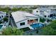 Aerial view of a backyard featuring a pool and outdoor living space with desert landscaping at 1217 E Monte Way, Phoenix, AZ 85042