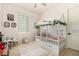 Charming bedroom featuring a beautiful, decorated house-frame bed and patterned rug at 1217 E Monte Way, Phoenix, AZ 85042