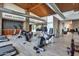Well-equipped fitness center with cardio machines, wood accents, and motivational wall art at 1217 E Monte Way, Phoenix, AZ 85042