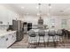 Spacious kitchen island with seating and stainless steel appliances at 1217 E Monte Way, Phoenix, AZ 85042