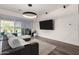 Bright living room with a sliding door and view of the pool at 1217 E Monte Way, Phoenix, AZ 85042