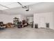 Spacious garage with epoxy floors is perfect for storage and organization of all your stuff at 1284 W Sussex St, San Tan Valley, AZ 85143