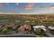 Expansive aerial view of a desert community nestled amidst natural vegetation at 15600 E Robin Dr, Fountain Hills, AZ 85268