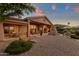 Charming backyard with lush landscaping, covered patio, and serene ambience at 15600 E Robin Dr, Fountain Hills, AZ 85268
