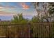 Backyard fence view highlighting privacy, shrubbery and mountain views at 15600 E Robin Dr, Fountain Hills, AZ 85268