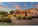 Beautiful home exterior with desert landscaping and outdoor living spaces at 15600 E Robin Dr, Fountain Hills, AZ 85268