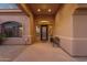 Inviting covered front porch with a decorative window over the door at 15600 E Robin Dr, Fountain Hills, AZ 85268