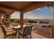 Inviting covered patio with outdoor seating, ideal for enjoying the beautiful sunset views at 15600 E Robin Dr, Fountain Hills, AZ 85268
