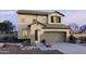 Charming two-story home with manicured landscaping and a welcoming facade, a perfect Gathering home at 15616 W Hackamore Dr, Surprise, AZ 85387