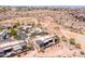 A desert community aerial shot showcasing home design, drought-resistant landscaping, and well-maintained streets at 16134 E Ridgestone Dr, Fountain Hills, AZ 85268