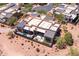 Aerial view of the property with its private outdoor living spaces, pool and desert surroundings at 16134 E Ridgestone Dr, Fountain Hills, AZ 85268