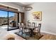 Cozy dining area with a sliding glass door overlooking the outdoor space with a grill at 16134 E Ridgestone Dr, Fountain Hills, AZ 85268
