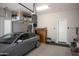 This well-lit garage features ample storage and parking for a car at 16134 E Ridgestone Dr, Fountain Hills, AZ 85268