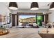 A kitchen island sink overlooks an outdoor patio and a picturesque desert scene at 16134 E Ridgestone Dr, Fountain Hills, AZ 85268