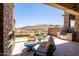 Enjoy the beautiful desert views from this covered outdoor space with built in grill at 16134 E Ridgestone Dr, Fountain Hills, AZ 85268