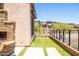 Relax in this covered patio that includes artificial turf, stone design, and mountain views at 16134 E Ridgestone Dr, Fountain Hills, AZ 85268