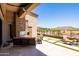 Relax on the cozy patio with a fireplace and enjoy the stunning desert views at 16134 E Ridgestone Dr, Fountain Hills, AZ 85268