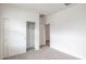 Bedroom with a closet and adjacent door, perfect for comfortable living at 17734 W Turquoise Ave, Waddell, AZ 85355