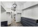 Walk-in closet with custom shelving and convenient laundry room access at 18371 W Roma Ave, Goodyear, AZ 85395