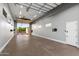 Large, open garage with epoxy flooring and lots of natural light at 18371 W Roma Ave, Goodyear, AZ 85395