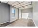 Spacious garage with natural light from a window and an automatic door opener at 18371 W Roma Ave, Goodyear, AZ 85395