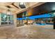 Inviting outdoor space with a wet bar, fire pit, lounge seating, and a view of the sparkling pool at 18371 W Roma Ave, Goodyear, AZ 85395