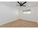 Bright bedroom features neutral walls, wood-look flooring, and a window at 2041 W Palo Verde Dr, Phoenix, AZ 85015
