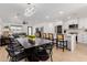 Open concept layout with dining area, kitchen, and living room with lots of natural light at 2041 W Palo Verde Dr, Phoenix, AZ 85015