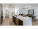 Stylish kitchen with white countertops, wood cabinets, and stainless steel appliances at 2041 W Palo Verde Dr, Phoenix, AZ 85015