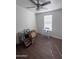 Clean bedroom offers neutral tones and a ceiling fan to keep you cool at 2600 E Allred Ave # R-88, Mesa, AZ 85204